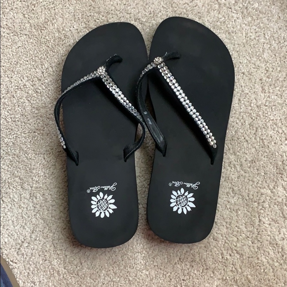 Black flip flops